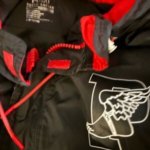 Black, white and red windbreaker by Ralph Lauren.  Perfect condition wore once